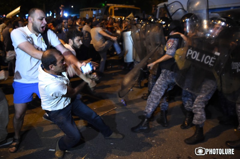 Protesters clash with police 13