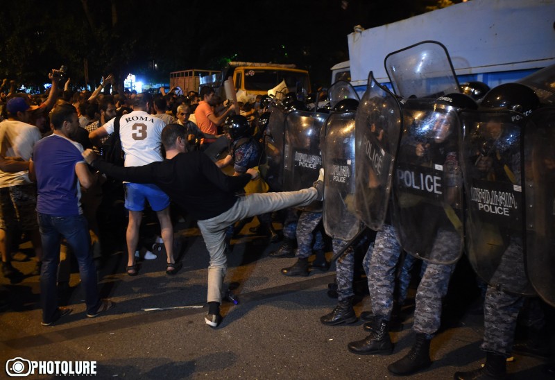 Protesters clash with police 4