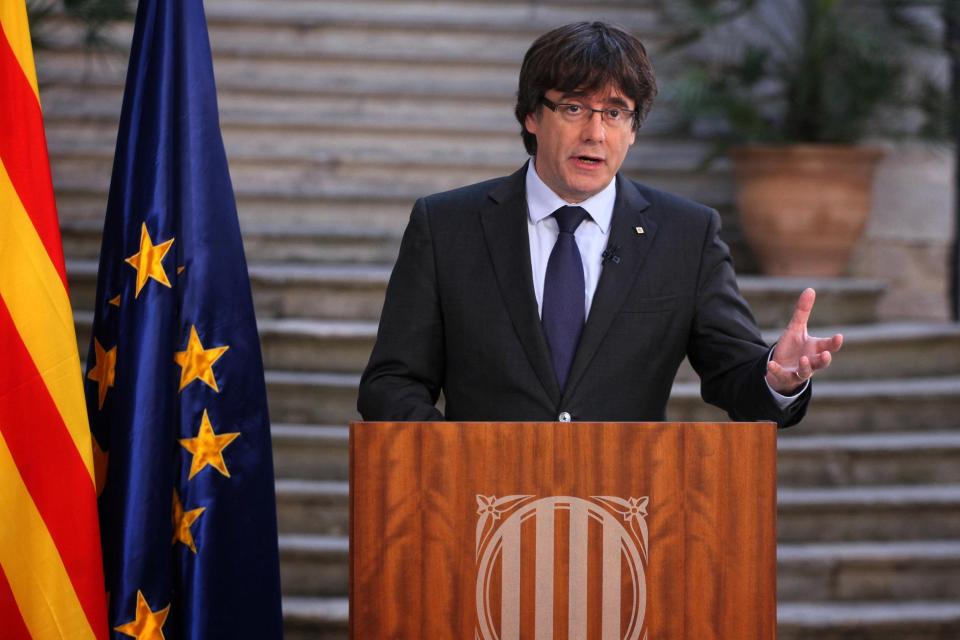 Ousted Catalan leader sounds defiant but accepts election